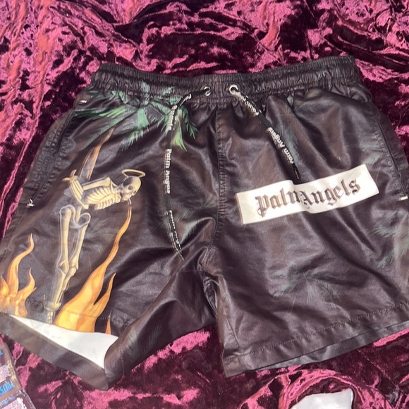 Worn once swim shorts palm angel